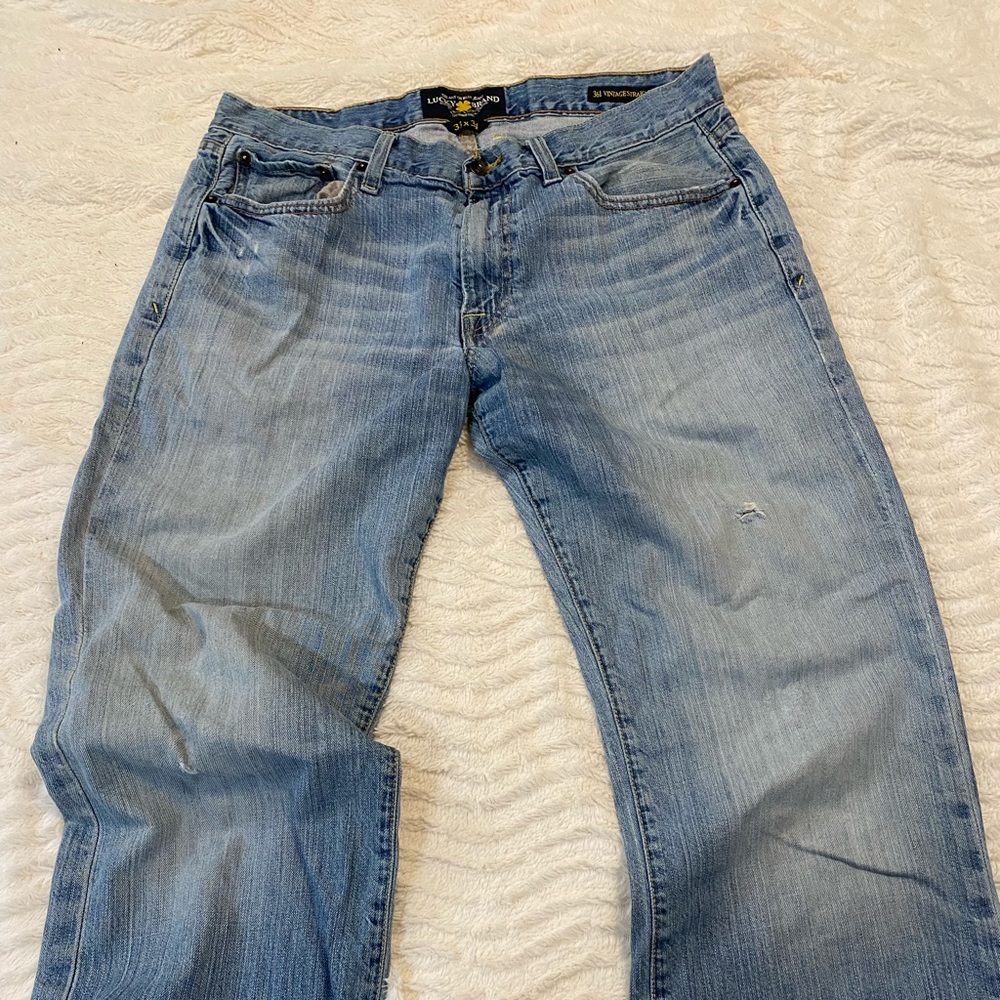 LUCKY brand Mens jeans. Size 33x34. Light washed denim. Some distressing see pic